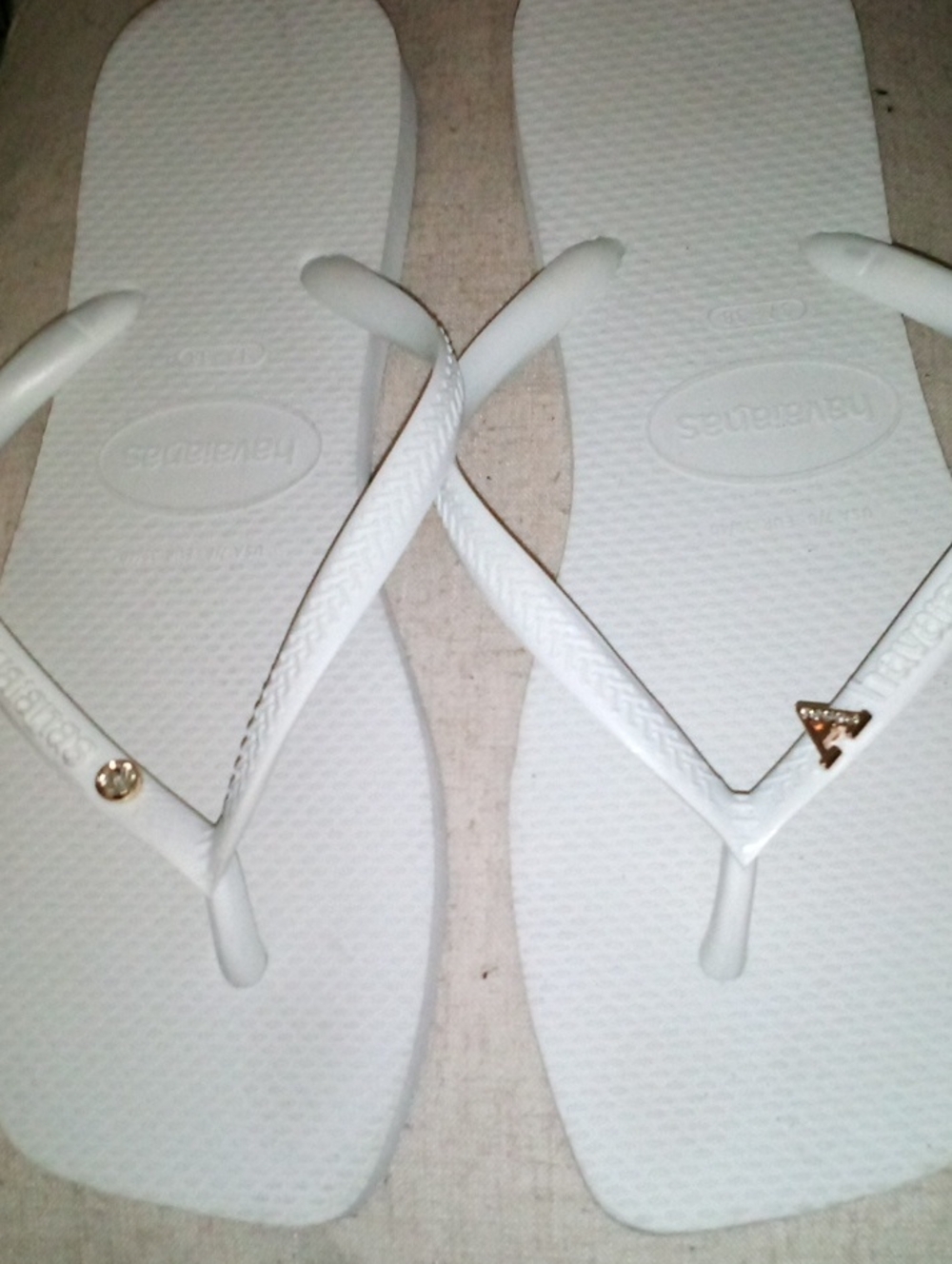 Havaianas Women’s White Flip Flops with Gold Accents